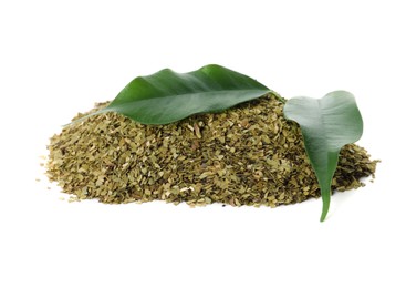 Photo of Pile of aromatic mate tea and fresh leaves on white background