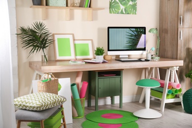 Photo of Comfortable workplace with modern computer at home