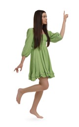 Photo of Beautiful girl in green dress on white background
