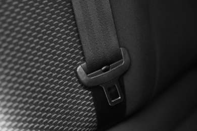 Photo of Safety belt on seat in car, closeup