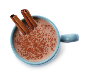 Photo of Delicious cocoa drink with cinnamon sticks on white background, top view