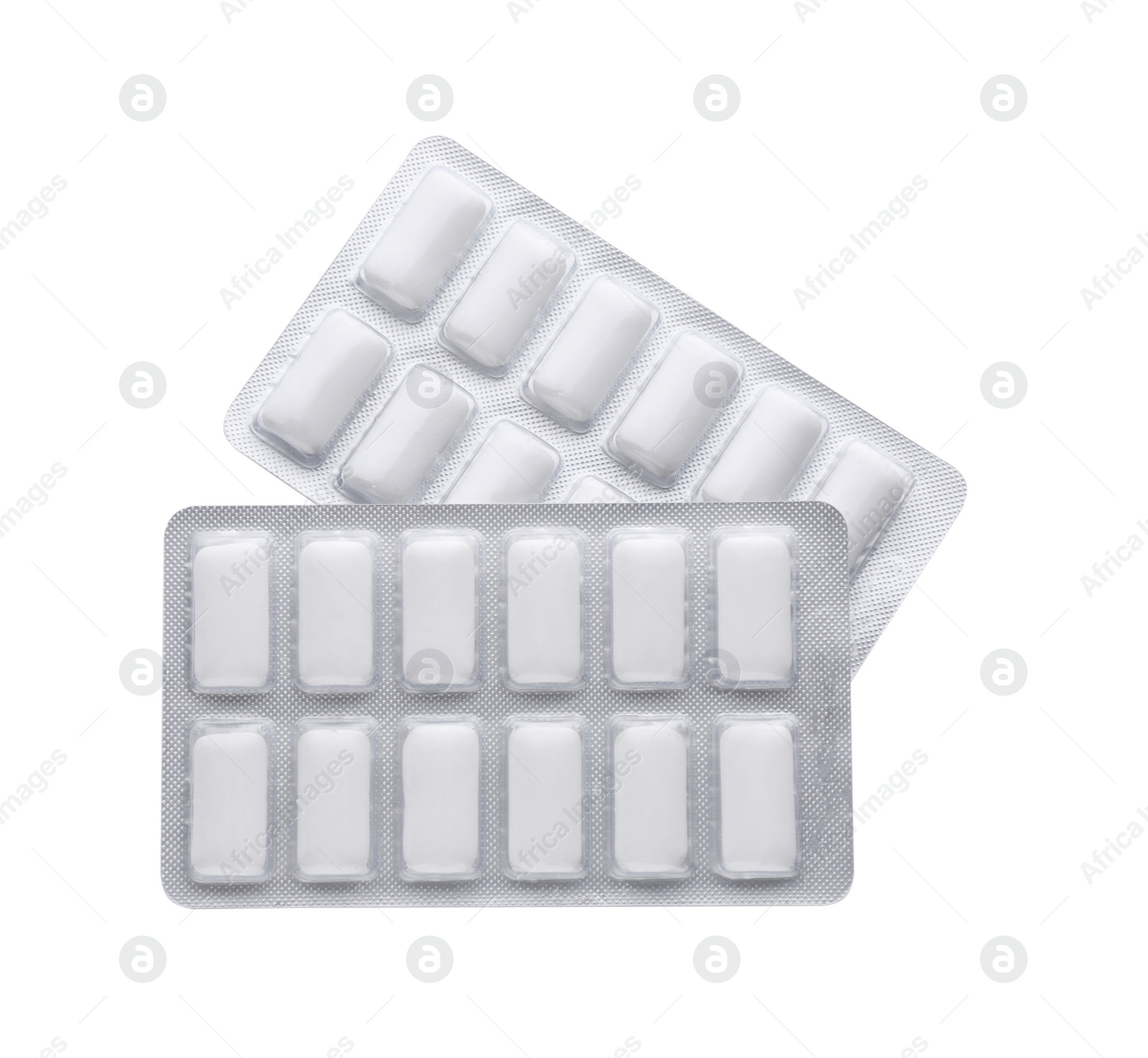 Photo of Blisters with chewing gums on white background, top view