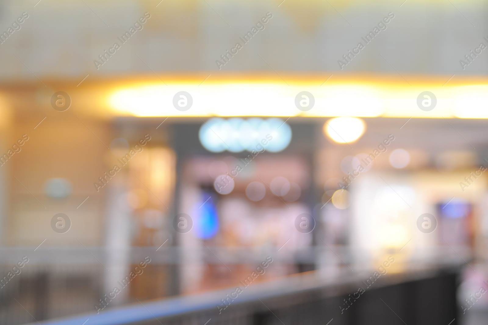 Photo of Blurred view of shopping mall interior. Bokeh effect