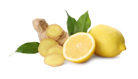 Photo of Fresh lemons and ginger on white background