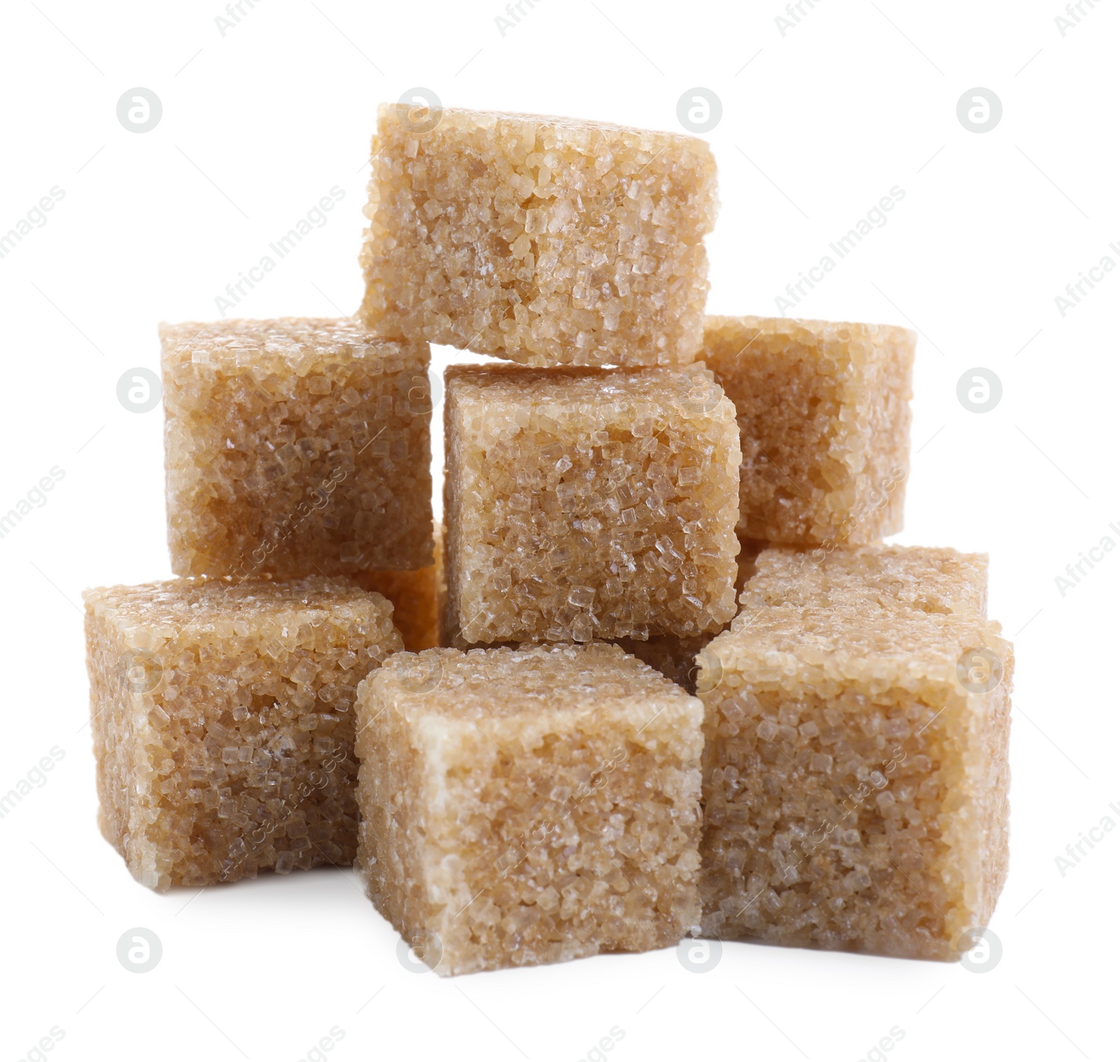 Photo of Many brown sugar cubes isolated on white