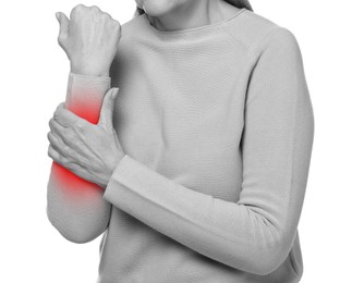 Image of Woman suffering from pain in arm, closeup. Black and white effect