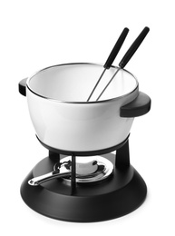 Photo of Modern fondue set on white background. Kitchen equipment