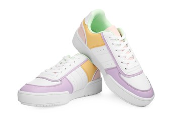 Photo of Pair of comfortable sports shoes on white background
