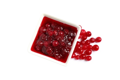 Cranberry sauce and fresh berries on white background, top view