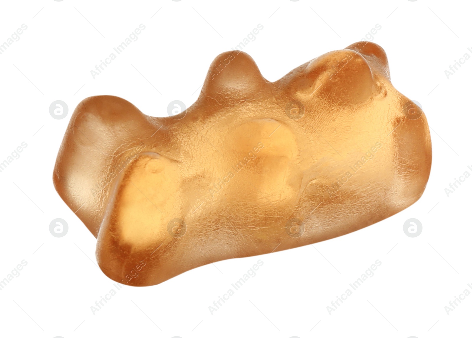 Photo of Delicious orange jelly bear on white background