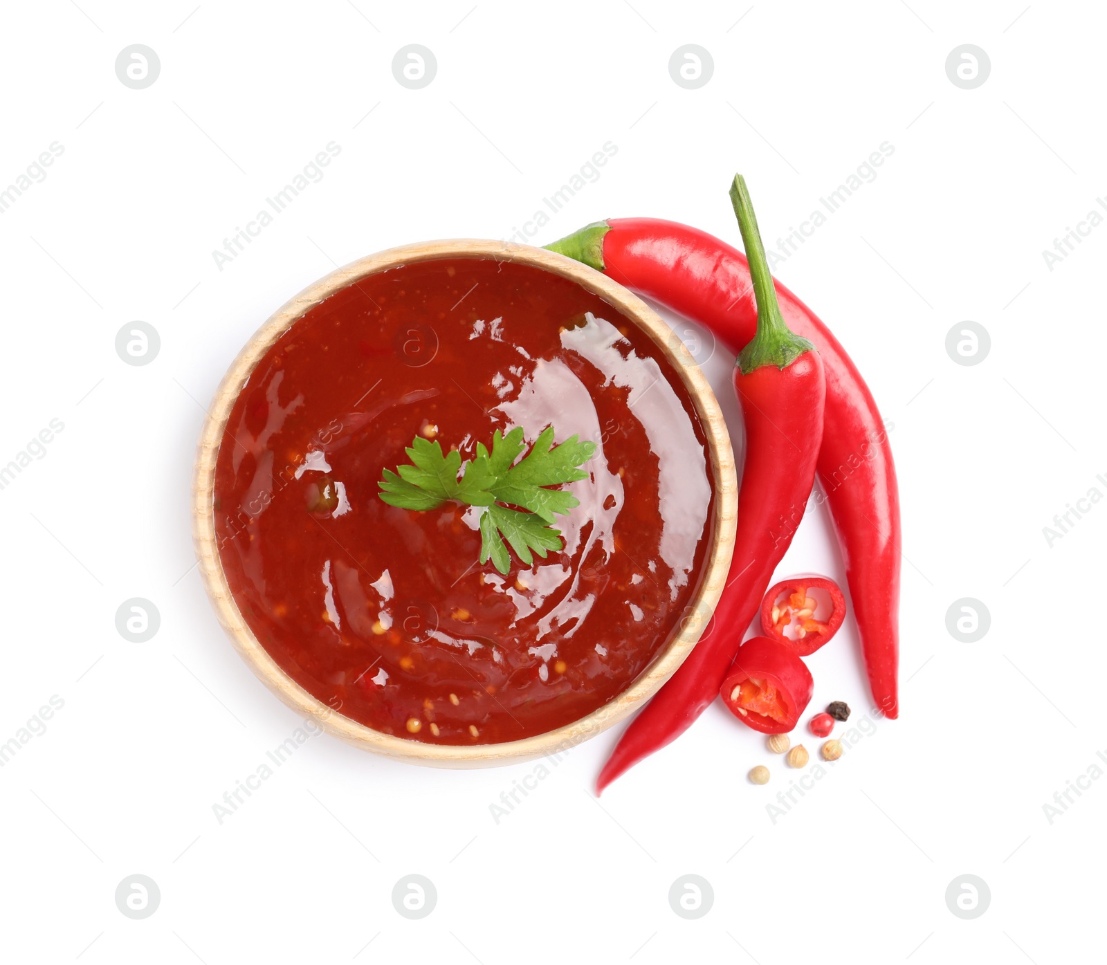 Photo of Spicy chili sauce on white background, top view