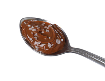 Photo of Salted caramel in spoon isolated on white