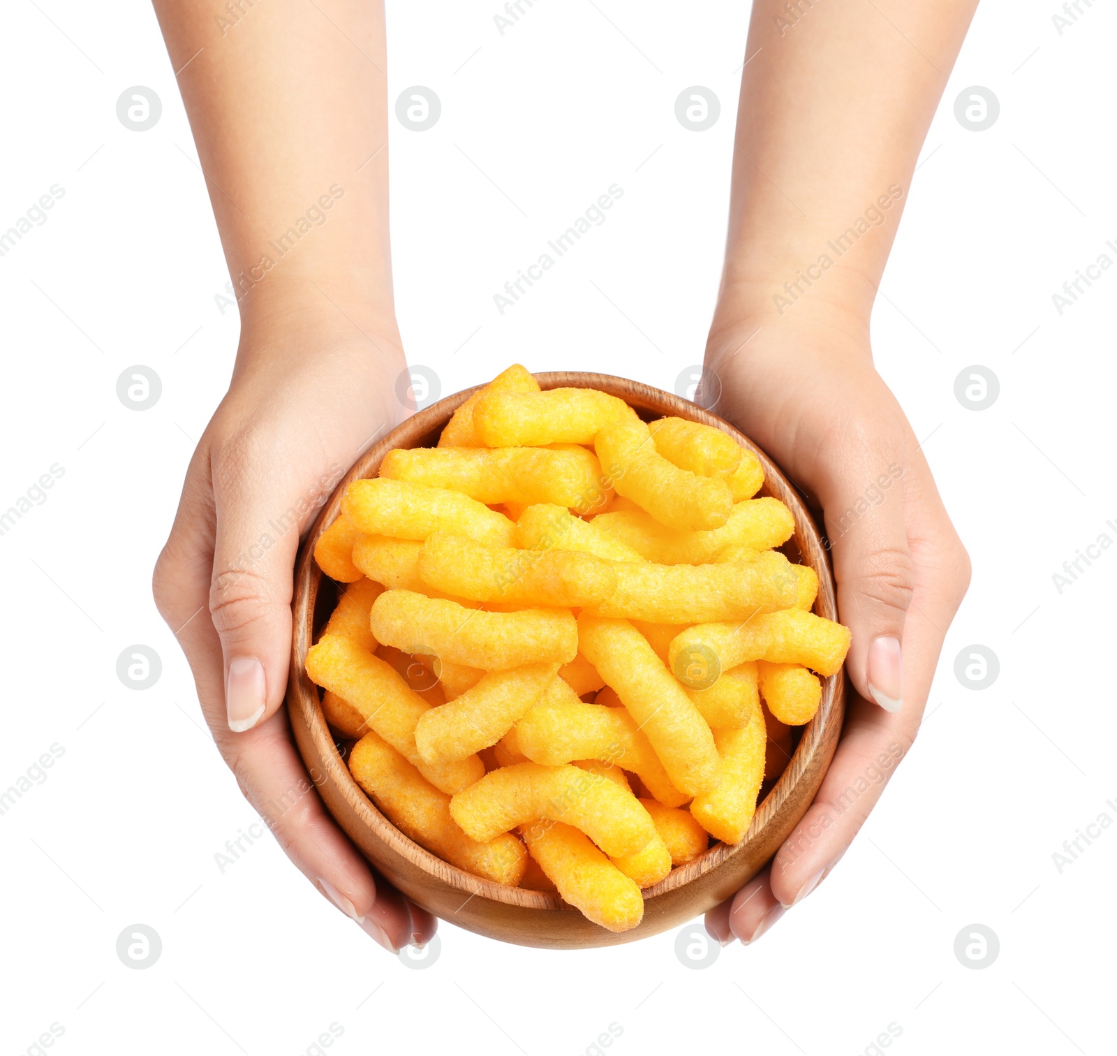 Photo of Woman holding bowl of crunchy cheesy corn sticks on white background, top view