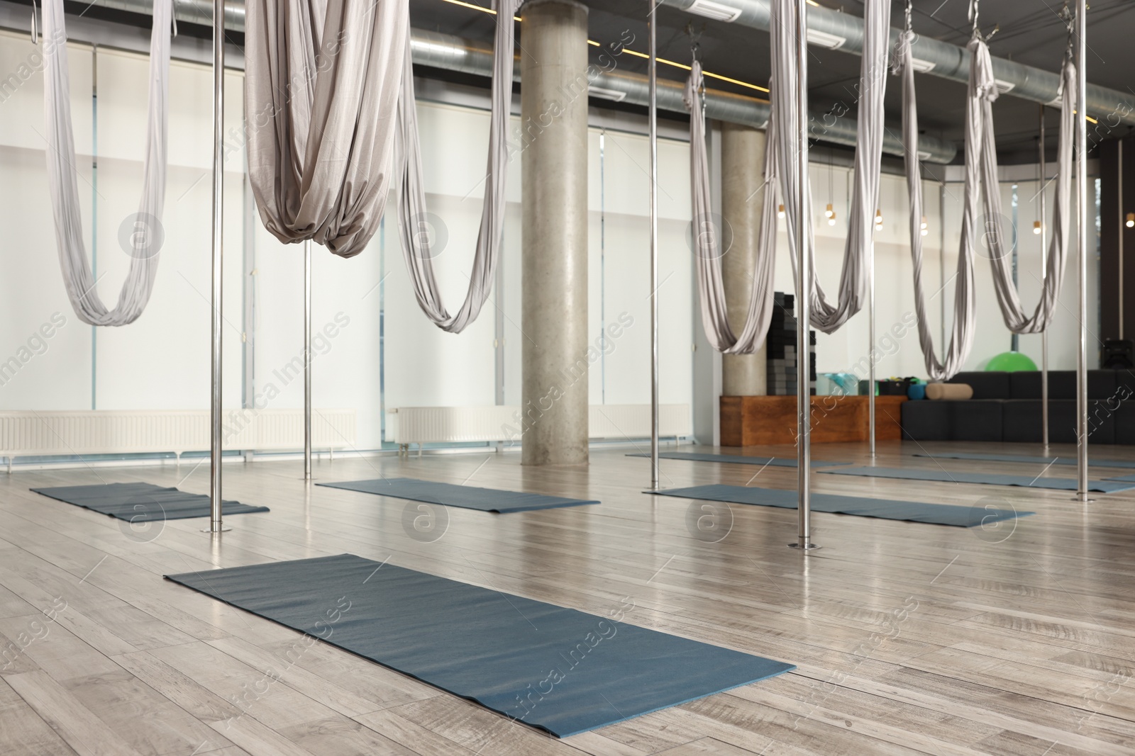 Photo of Many hammocks for fly yoga in studio