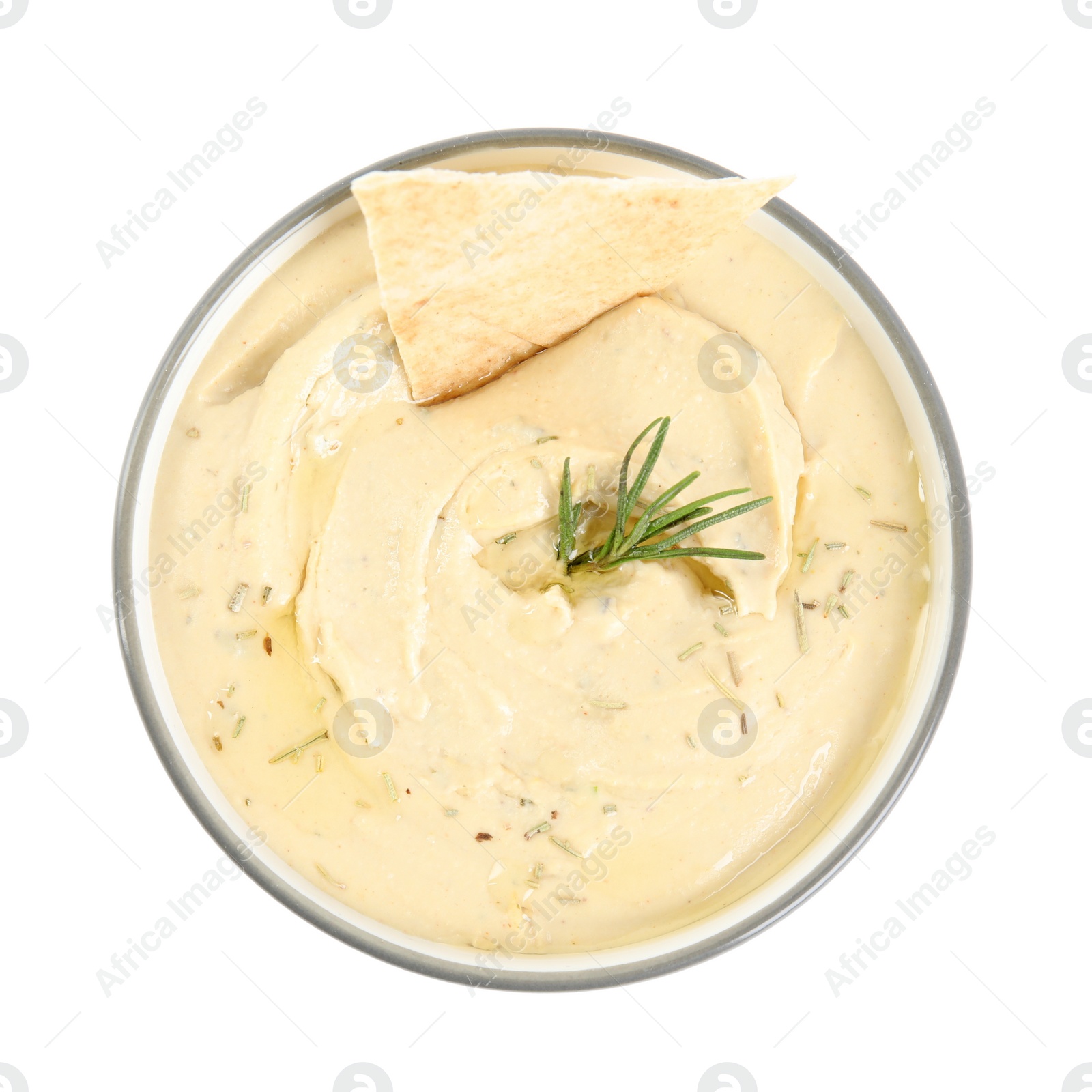 Photo of Delicious hummus with pita chip and rosemary in bowl isolated on white, top view
