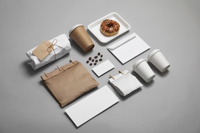 Photo of Composition with items for mock up design on gray background. Food delivery service