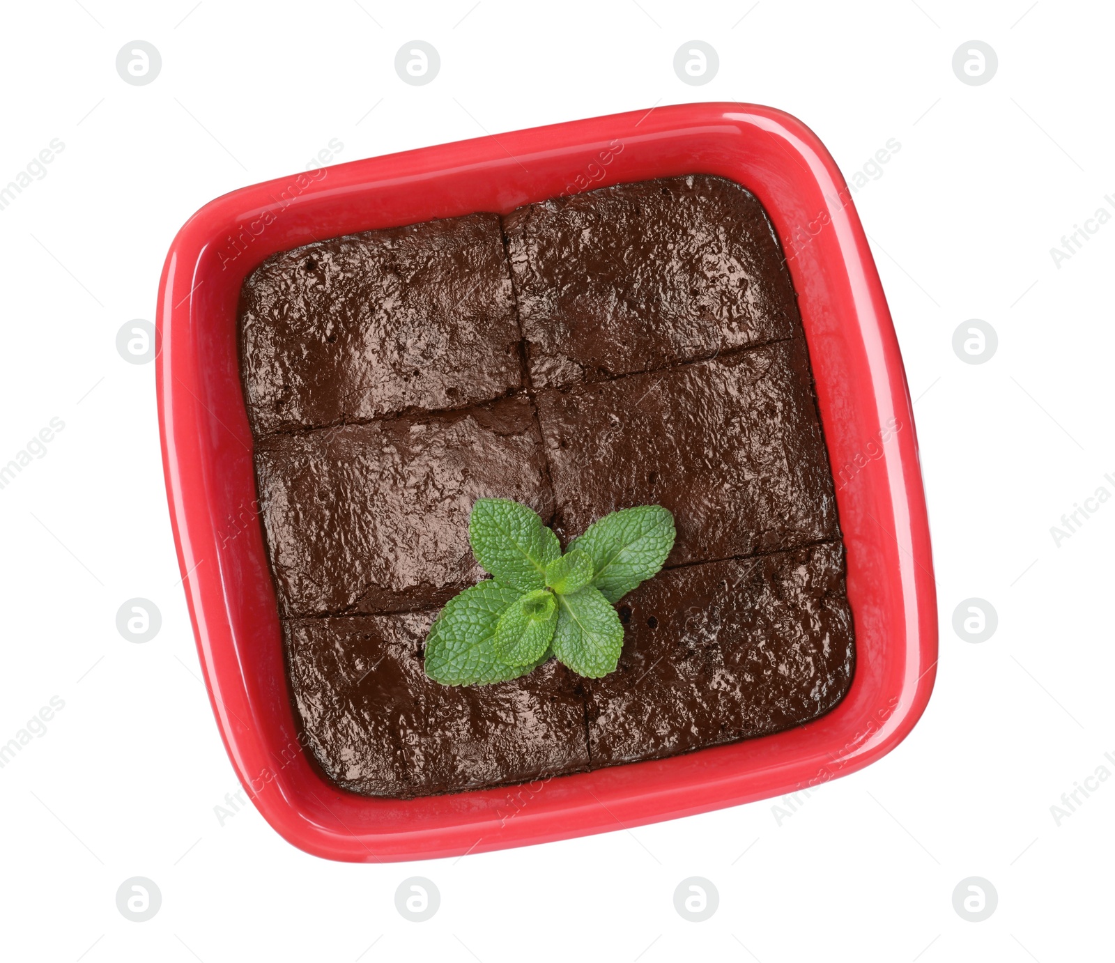 Photo of Delicious chocolate brownie with mint in baking dish on white background, top view