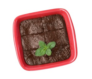 Photo of Delicious chocolate brownie with mint in baking dish on white background, top view