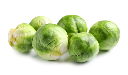 Photo of Fresh tasty Brussels sprouts on white background