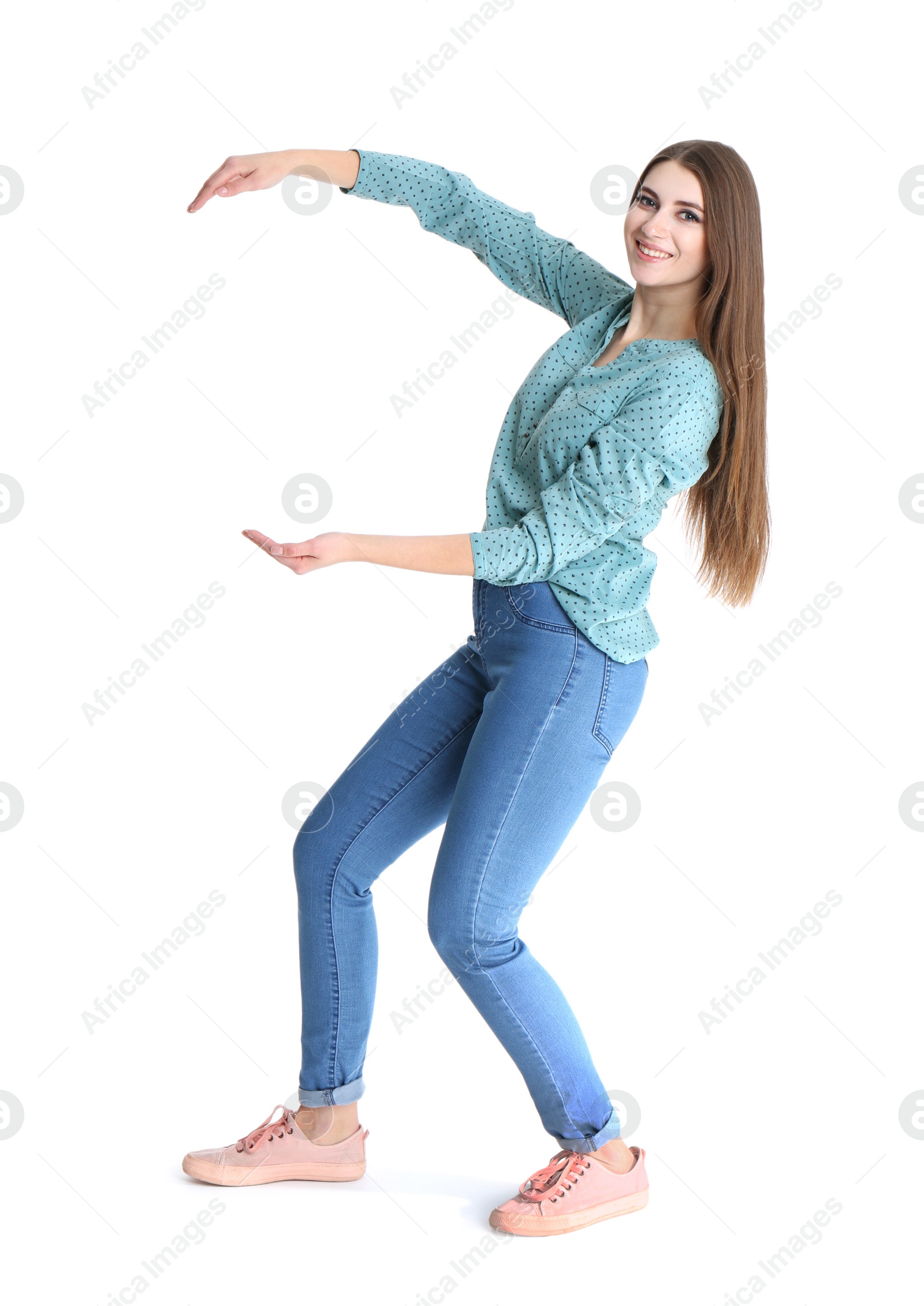 Photo of Young woman with magnet attracting people on white background