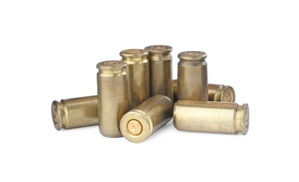 Cartridge cases isolated on white. Firearm ammunition