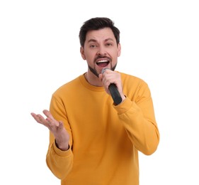 Photo of Handsome man with microphone singing on white background