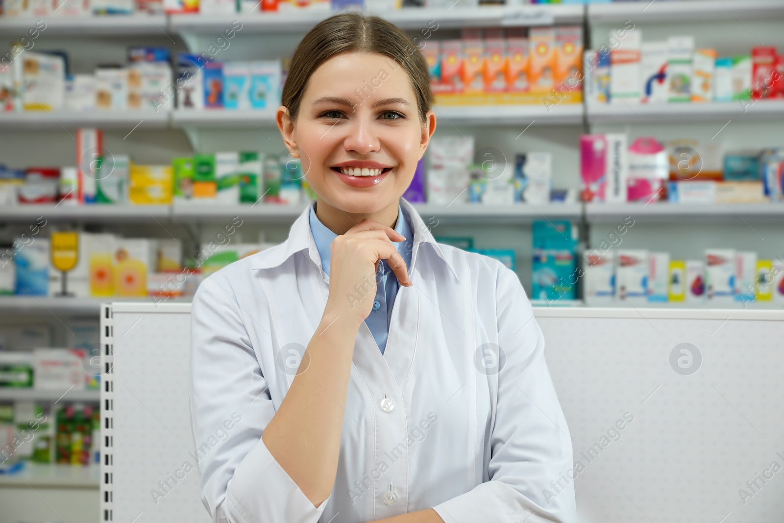 Photo of Portrait of professional pharmacist in modern drugstore