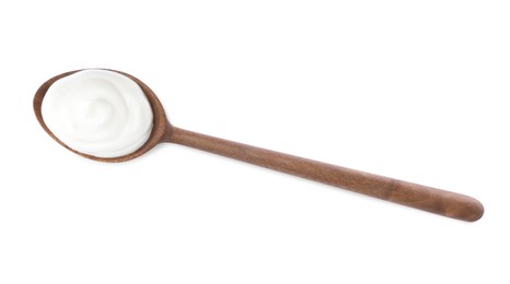 Delicious sour cream in wooden spoon on white background, top view