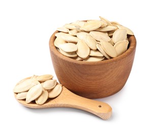 Photo of Wooden bowl and spoon with pumpkin seeds isolated on white