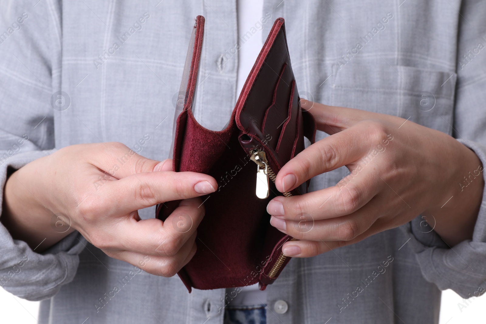 Photo of Poor woman with empty wallet, closeup view