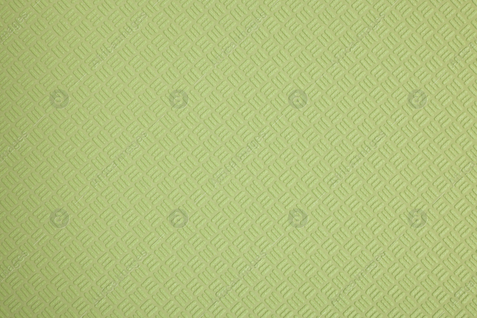 Photo of Stylish green wallpaper as background, closeup view