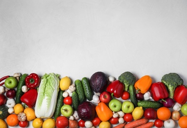 Photo of Variety of fresh delicious vegetables and fruits on table, flat lay. Space for text