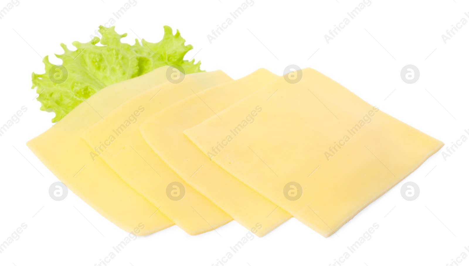 Photo of Slices of fresh cheese and lettuce isolated on white