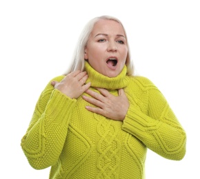 Mature woman suffering from cold on white background