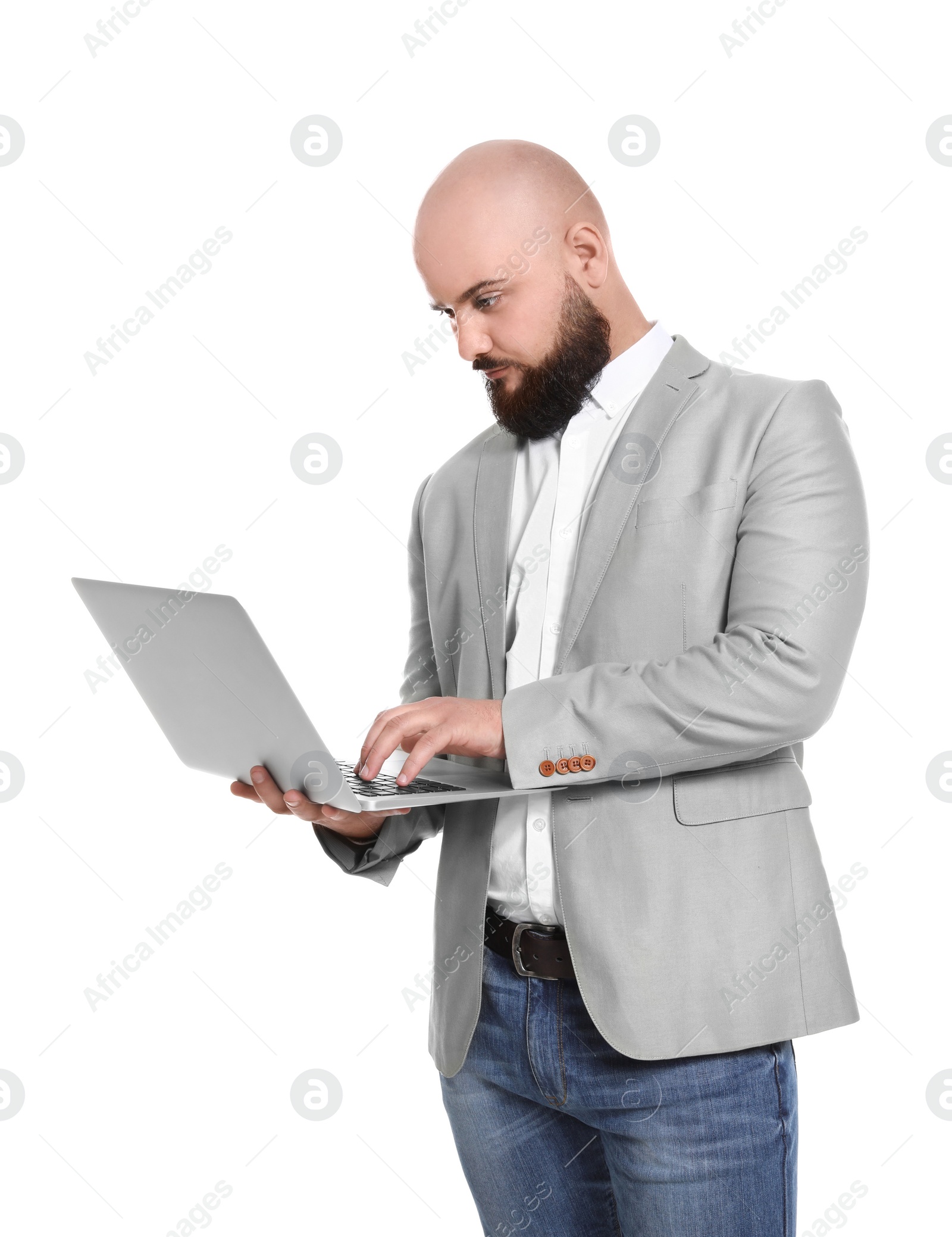 Photo of Portrait of confident young businessman with laptop on white background