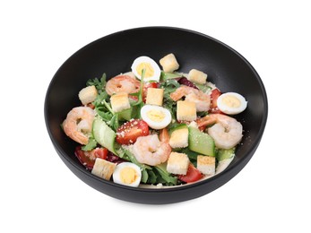 Bowl of delicious Caesar salad with shrimps isolated on white