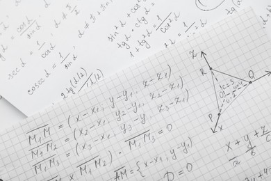 Photo of Sheets of paper with different mathematical formulas, top view