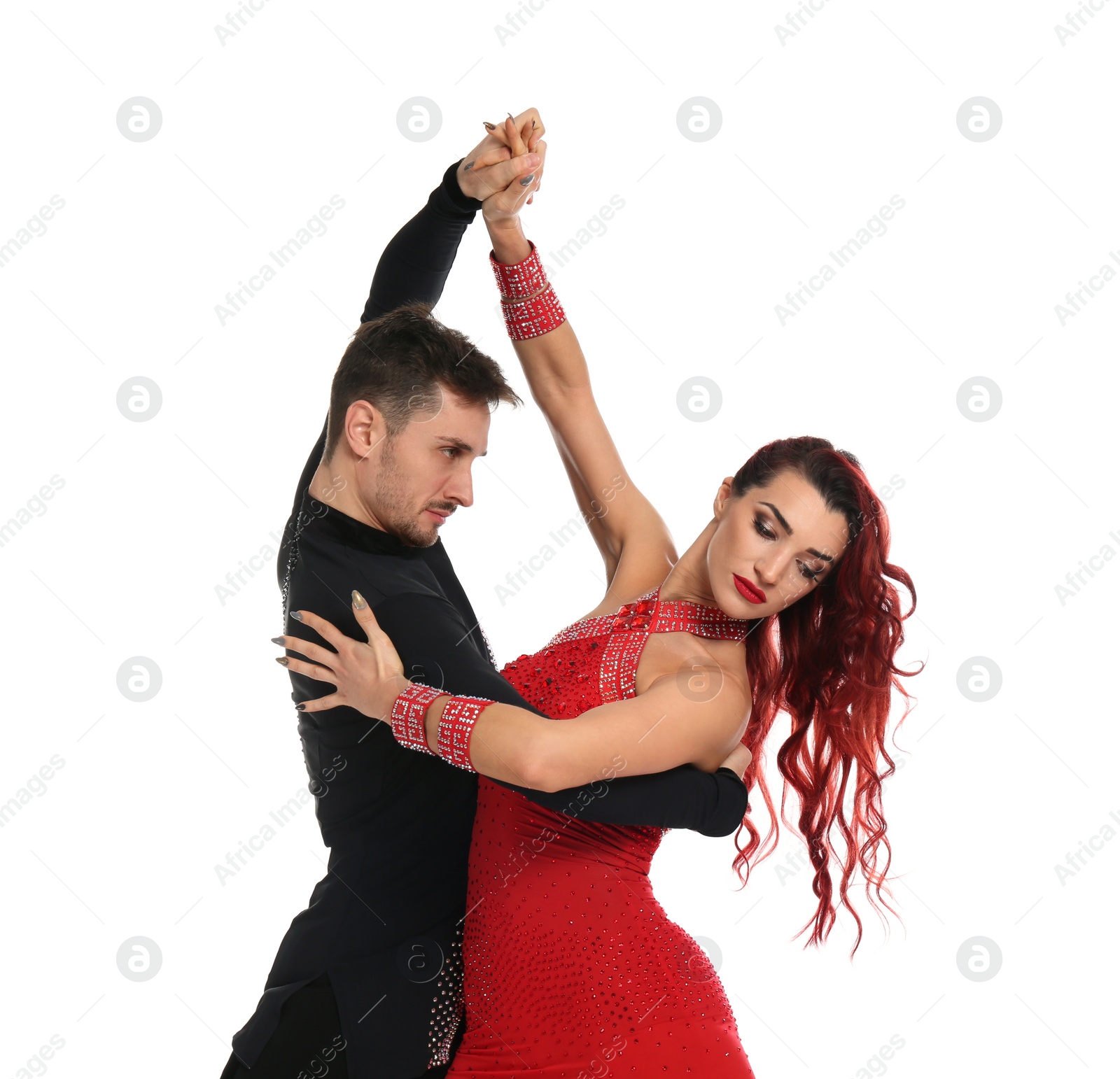 Photo of Passionate young couple dancing on white background