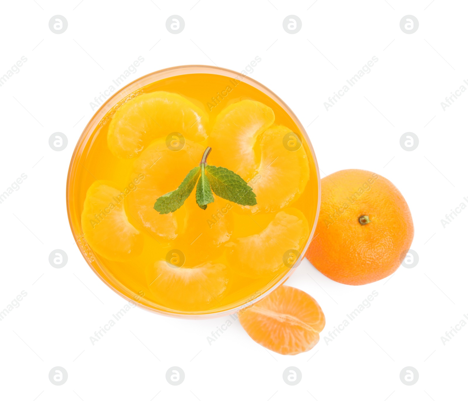 Photo of Delicious tangerine jelly with mint on white background, top view