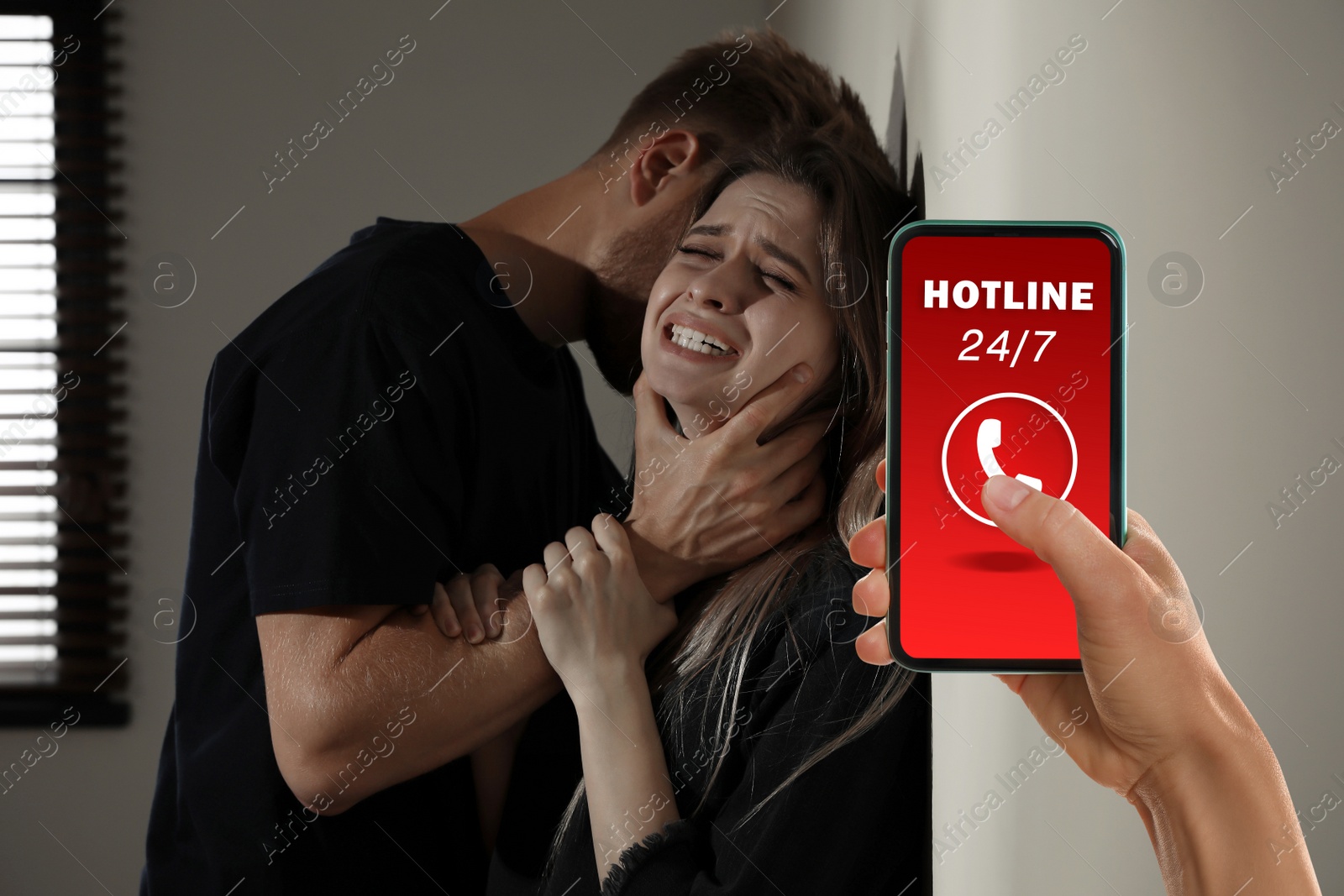 Image of Woman calling domestic violence hotline to prevent aggression upon girl