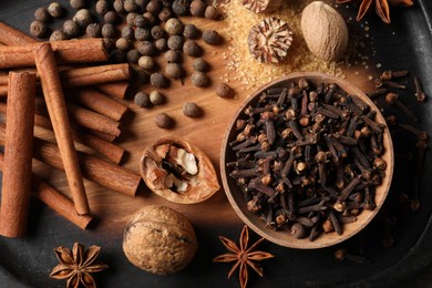 Photo of Different spices and nuts on table, flat lay