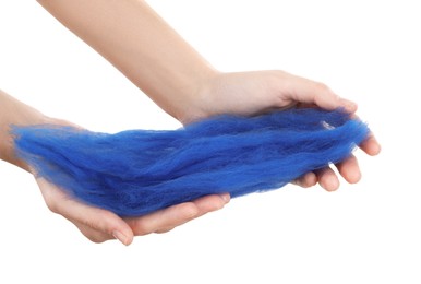 Photo of Woman holding blue felting wool on white background, closeup