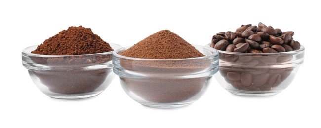 Photo of Bowls with different types of coffee on white background
