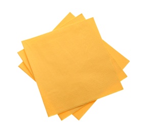 Photo of Yellow clean paper tissues on white background, top view