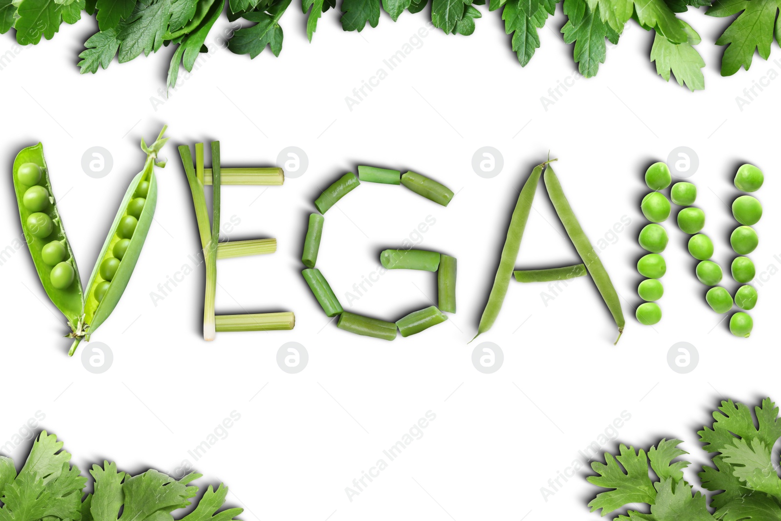 Image of Word VEGAN made of different fresh tasty vegetables on white background, flat lay