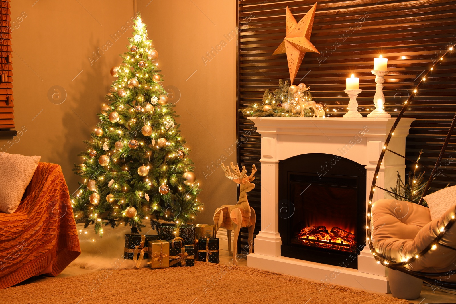 Photo of Beautiful living room interior with burning fireplace. Christmas celebration