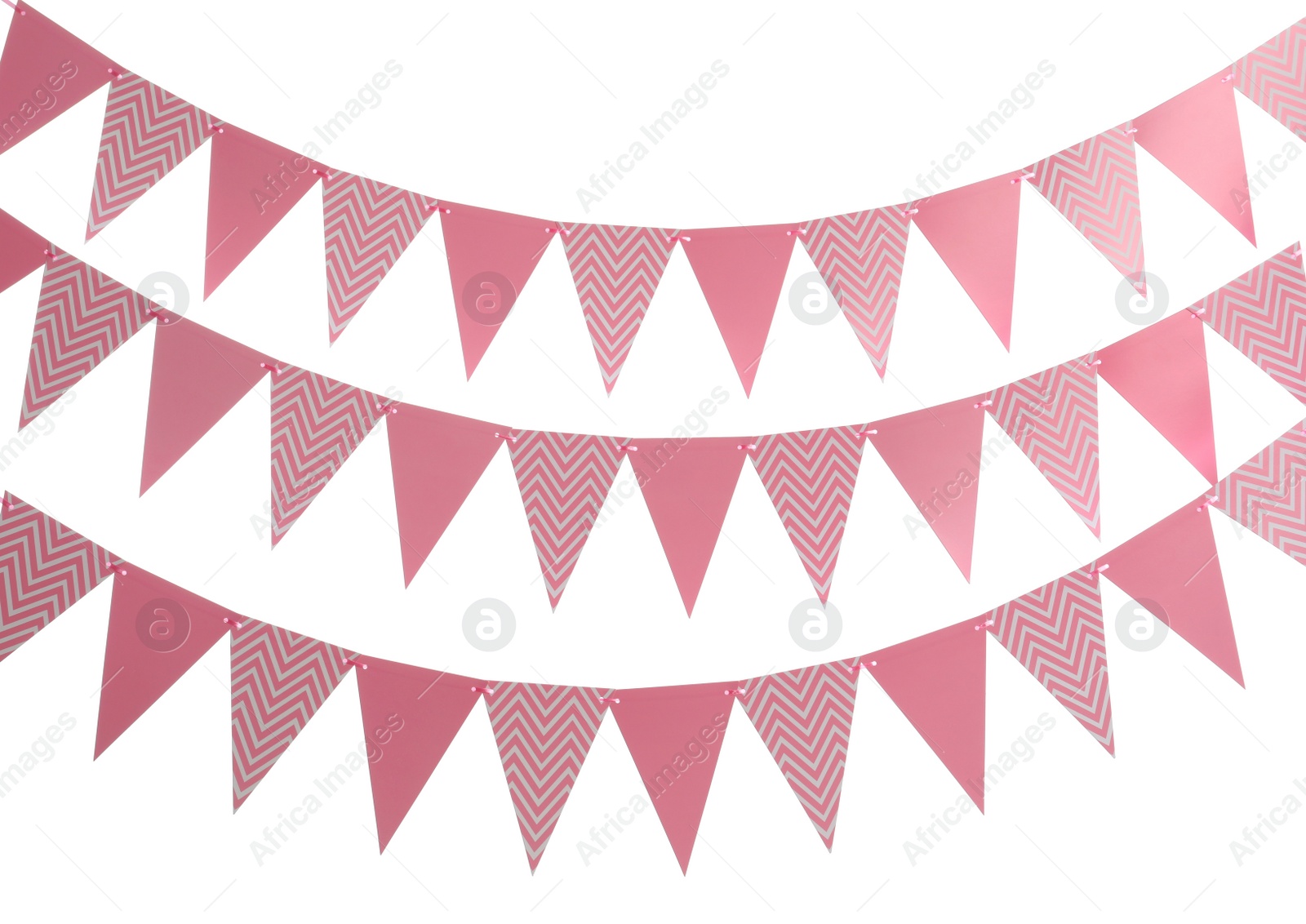 Photo of Buntings with triangular paper flags on white background. Festive decor