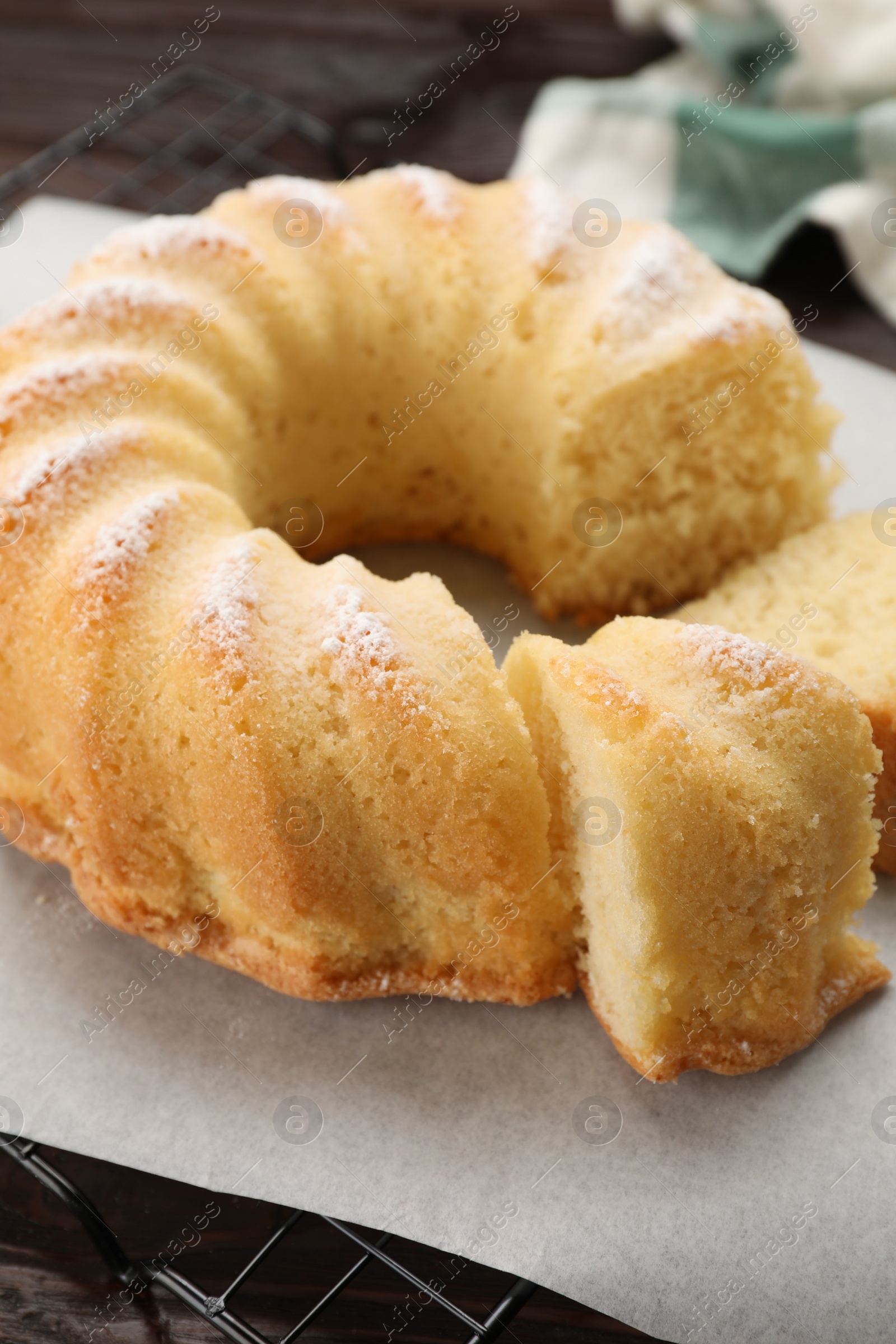 Photo of Delicious freshly baked sponge cake on table, closeup