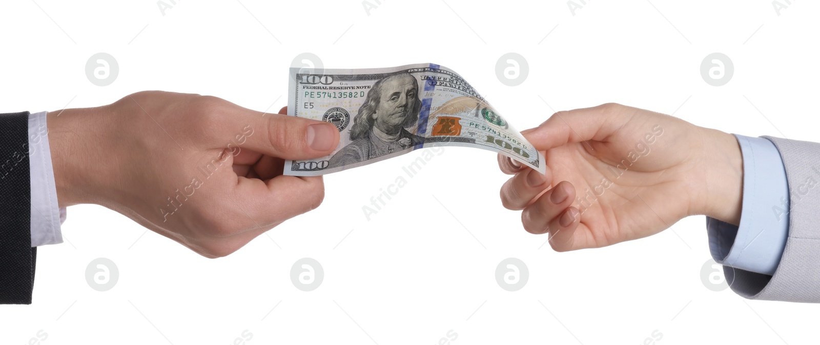 Photo of Money exchange. Man giving dollar banknote to woman on white background, closeup