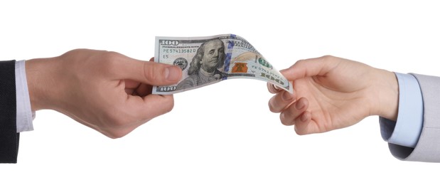 Photo of Money exchange. Man giving dollar banknote to woman on white background, closeup